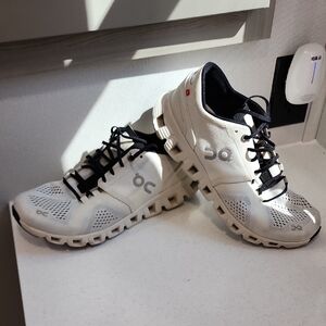 On Running Athletic Shoes in White and Black